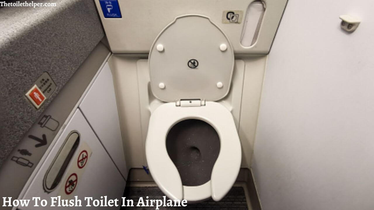 how to flush toilet in airplane